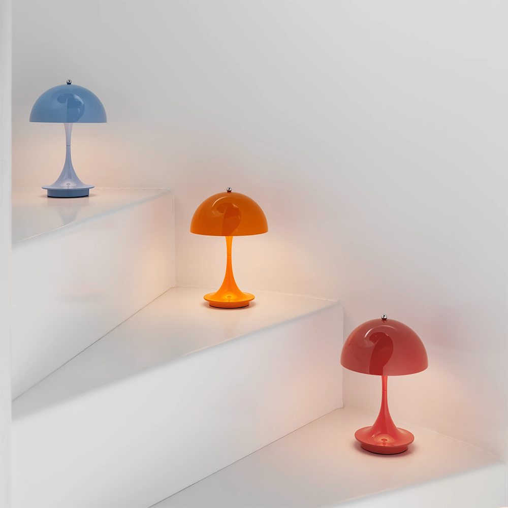 Tischleuchte PANTHELLA Portable im Farbton orange von Louis Poulsen
