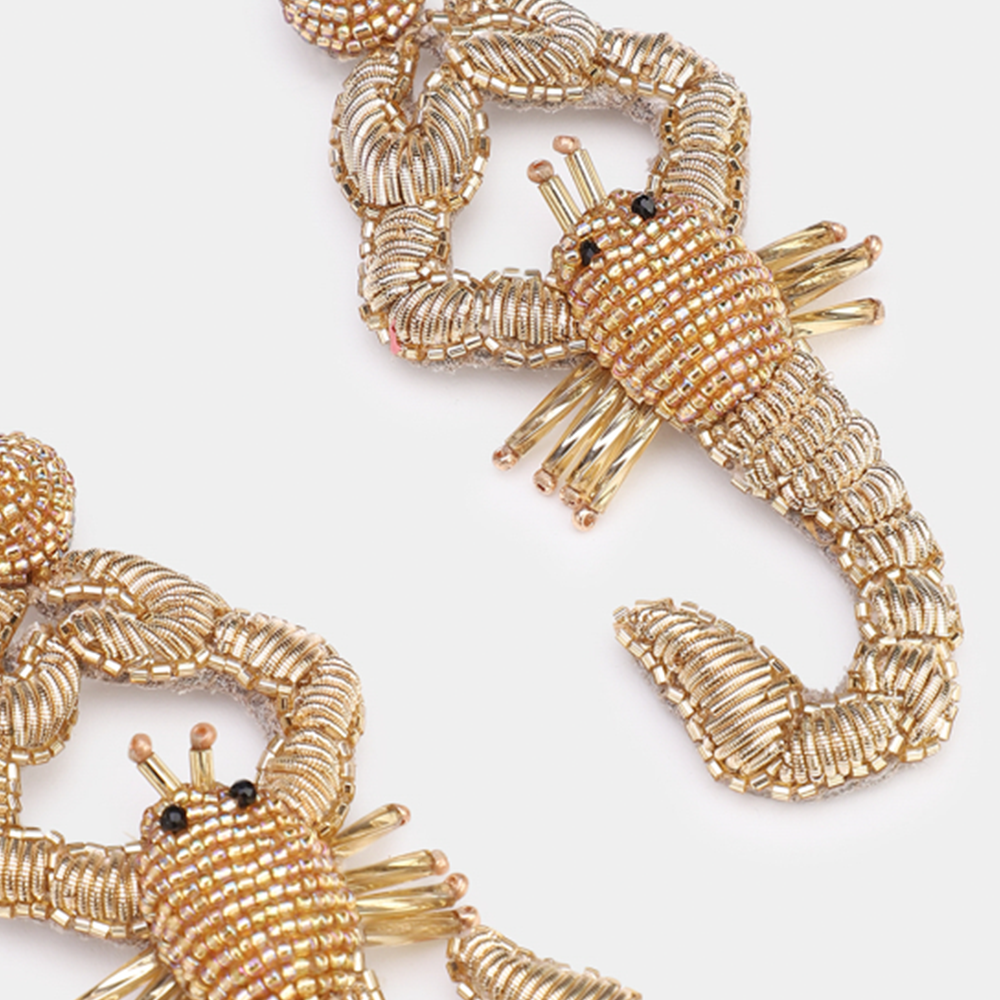 Ohrringe SCORPIO im Farbton gold von Olivia Dar, Handwerkskunst von Indien