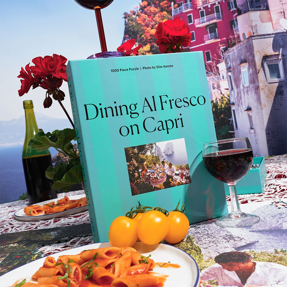 Bild Dining Al Fresco on Capri von Slim Aarons als Puzzle von Piecework Puzzles. Ein Puzzele mit 1000 Stück
