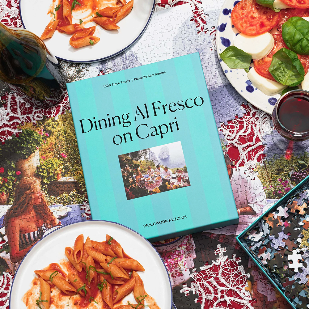 Bild Dining Al Fresco on Capri von Slim Aarons als Puzzle von Piecework Puzzles. Ein Puzzele mit 1000 Stück