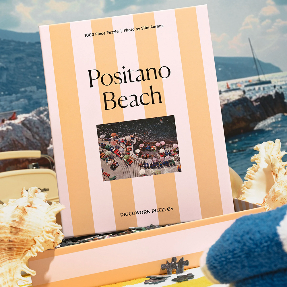 Bild Positano Beach von Slim Aarons als Puzzle von Piecework Puzzles. Ein Puzzele mit 1000 Stück