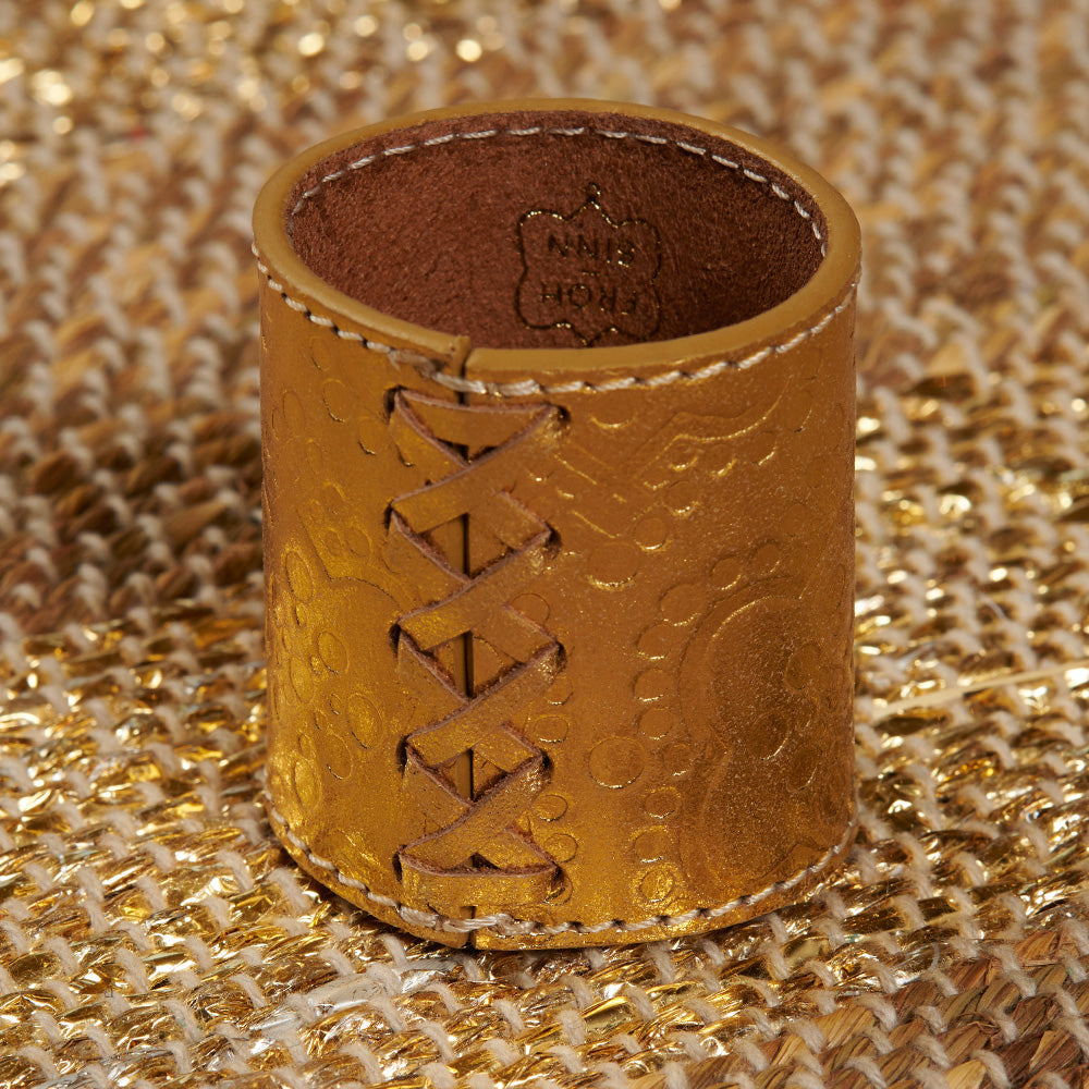 Handgemachtes Tischset aus Leder in gold