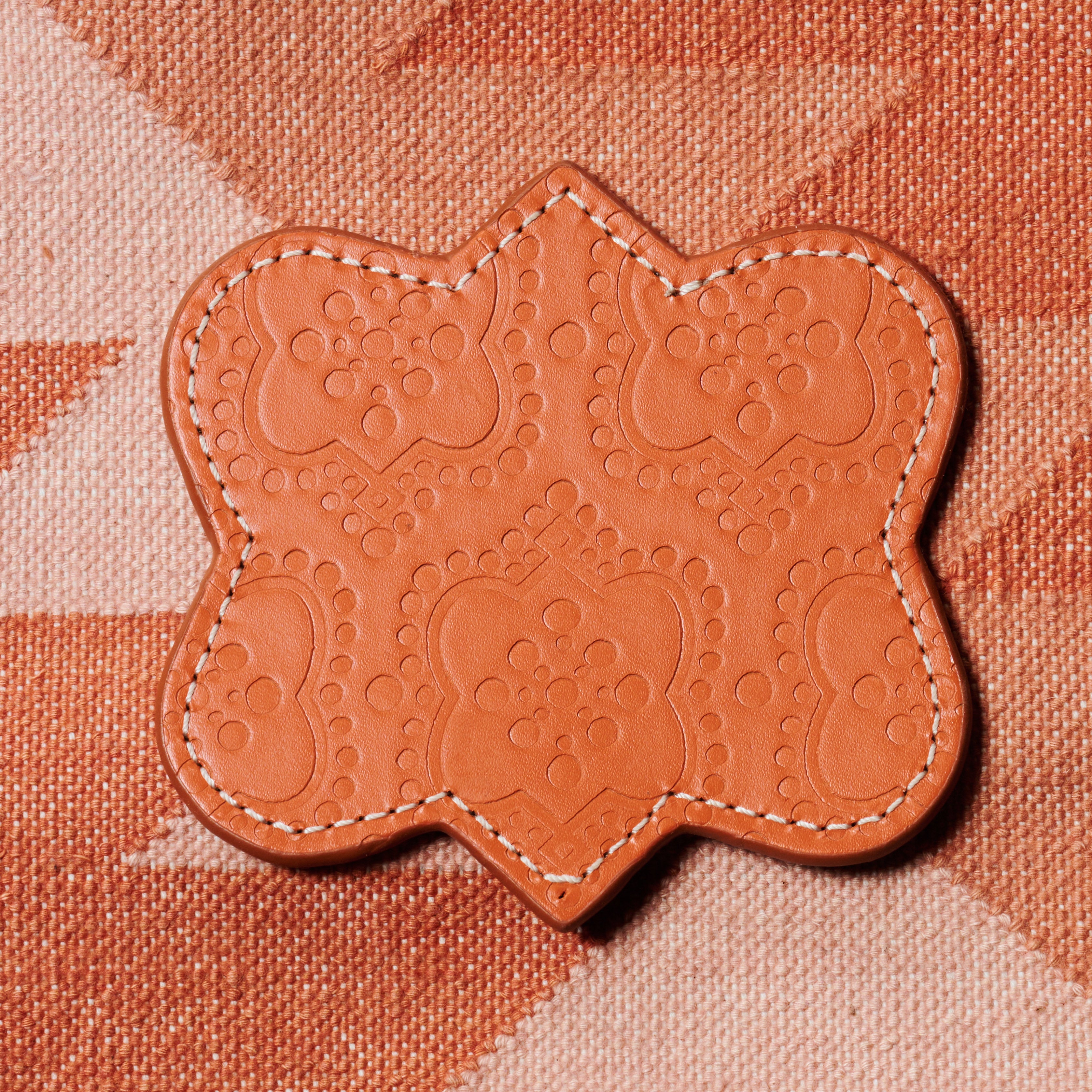 Untersetzer ICON aus Leder geprägt in orange