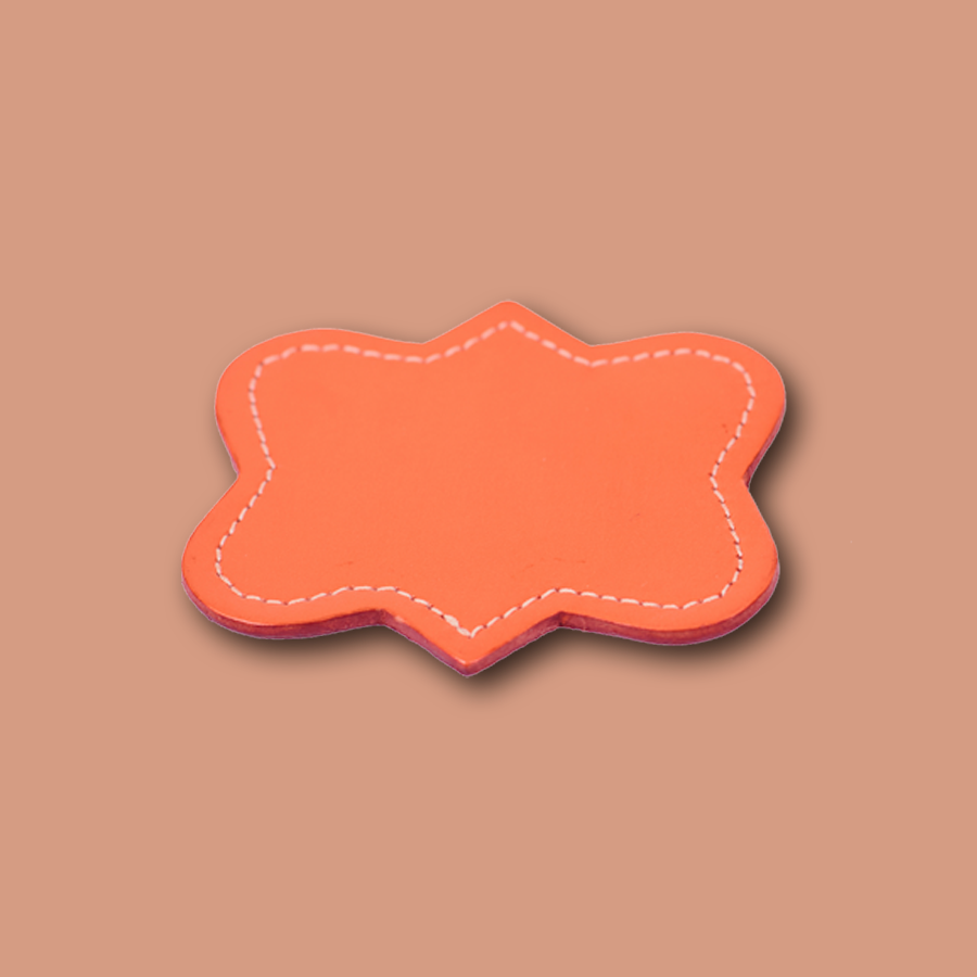 Handgemachter Untersetzer aus Leder in orange